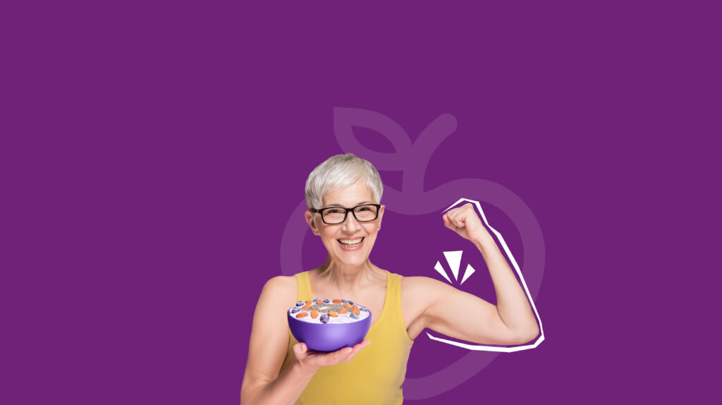 Woman holding bowl of nutritious breakfast